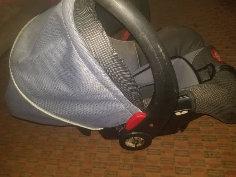 cot + car seat + carry cot 0