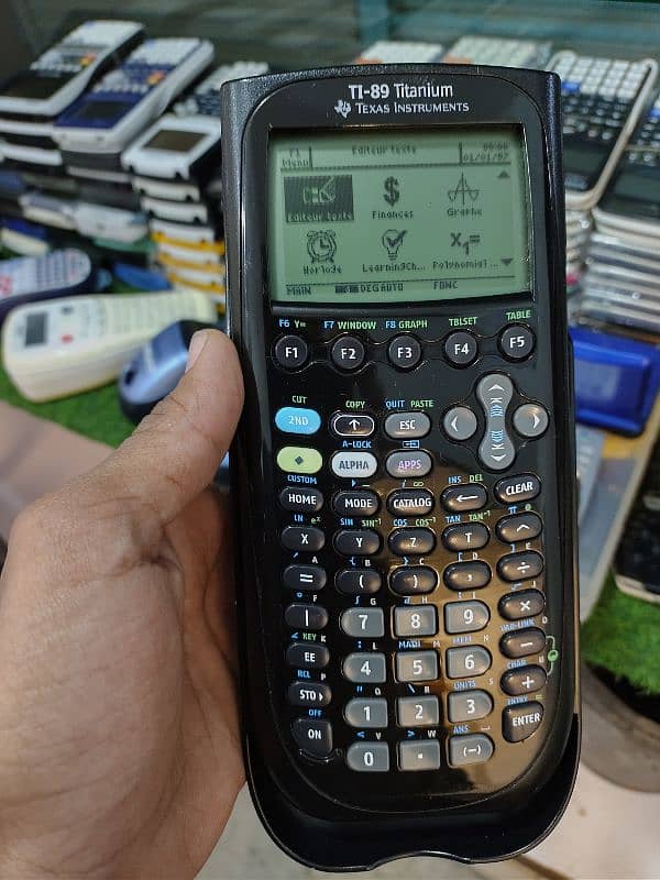 TEXAS INSTRUMENTS TI-89 TITANIUM GRAPHIC  CALCULATORS PROGRAMMABLE 9