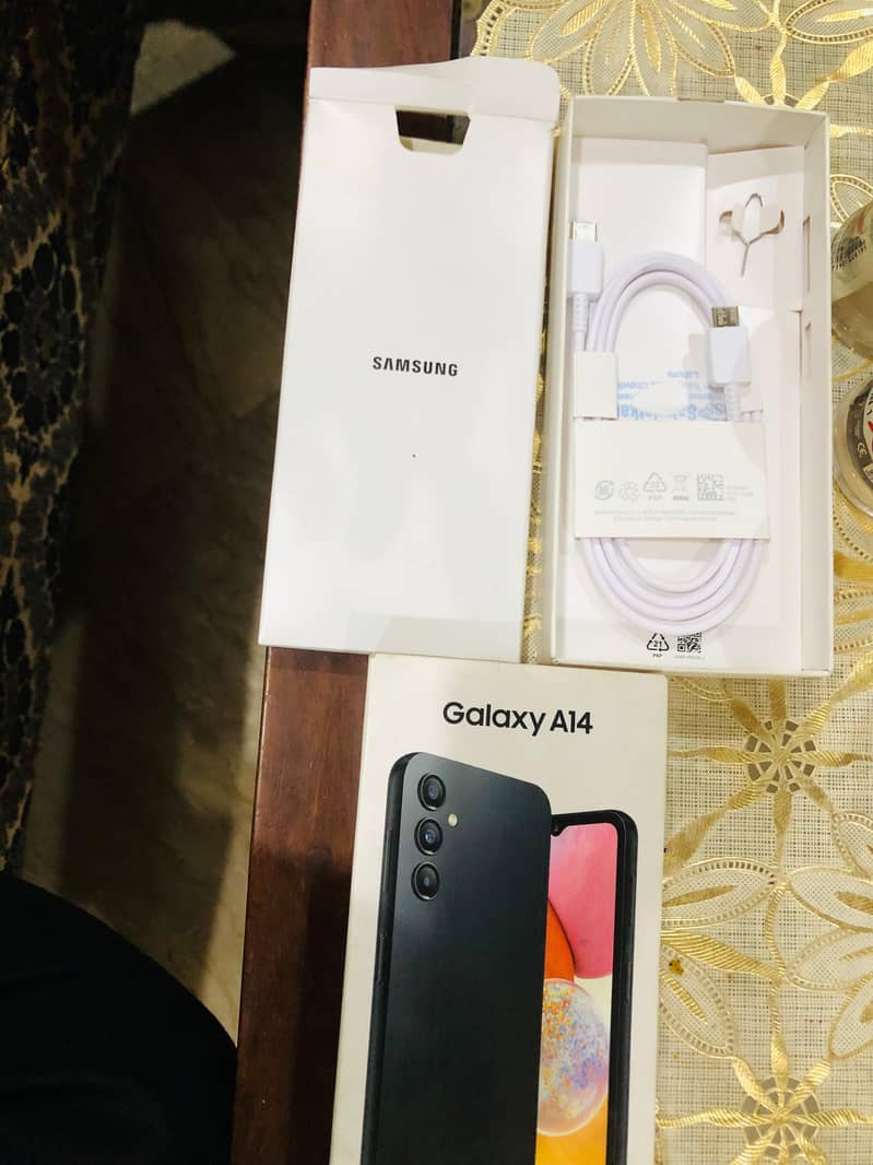 Samsung A14 with box and new charger 0