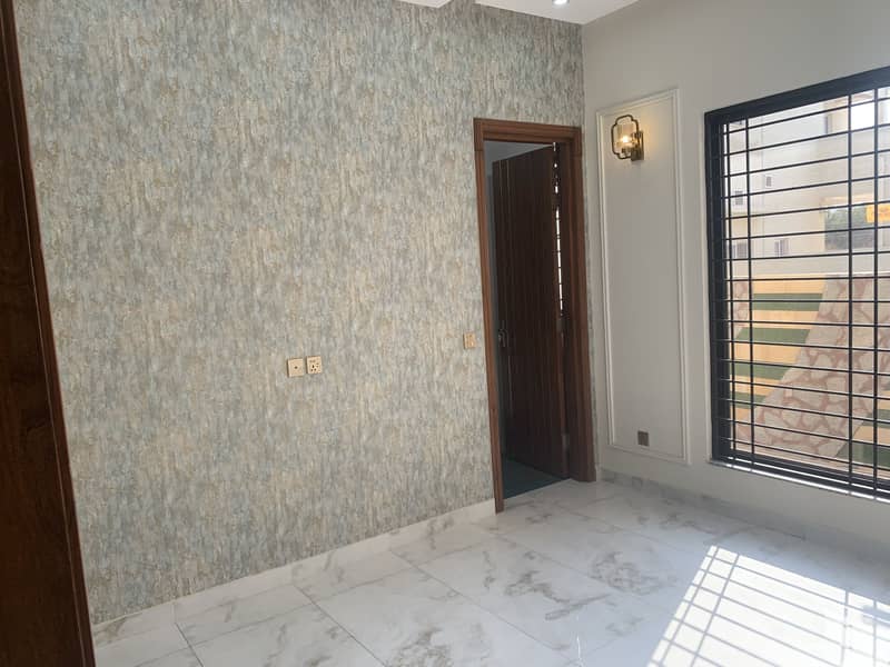 10 MARLA HOUSE ON "50" FEET WIDE ROAD BRAND NEW WOW LOCATION OF DHA PHASE 11 RAHBAR SECTOR 1 IS AVAILABLE FOR SALE 1