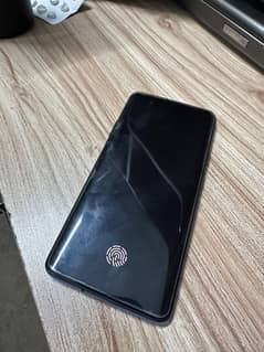 One Plus 7 Pro along with original charger and phone case