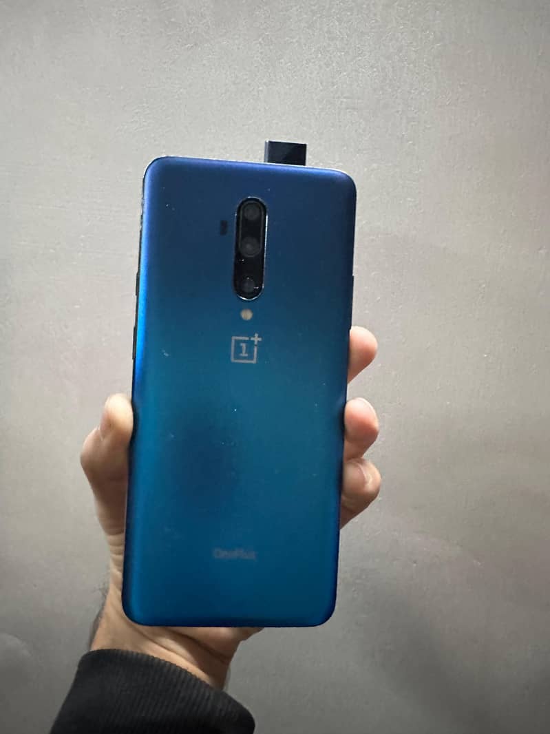 One Plus 7 Pro along with original charger and phone case 3