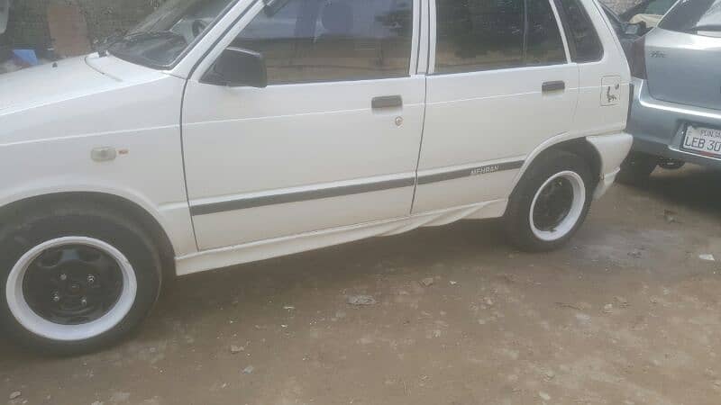 Suzuki Mehran VX 2005 non excdent milag orignal tyre normal same like 15