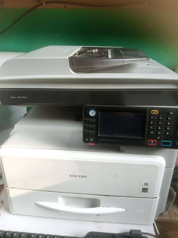 Ricoh 3 in 1 photocopy machine 0