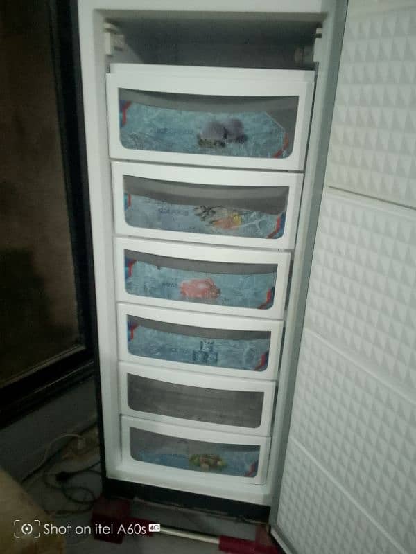 Dawlance vertical freezer 4