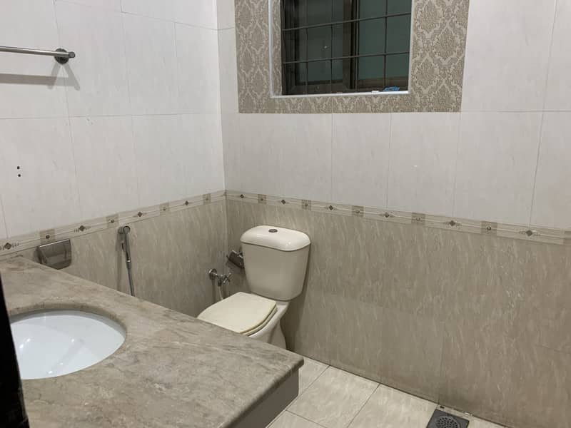 12 marla house for sale in Johar Town block p  Semi commercial (0rignal pictures) Hot location  Tile flooring  Double kitchen unit Hot location  Main apporced 7