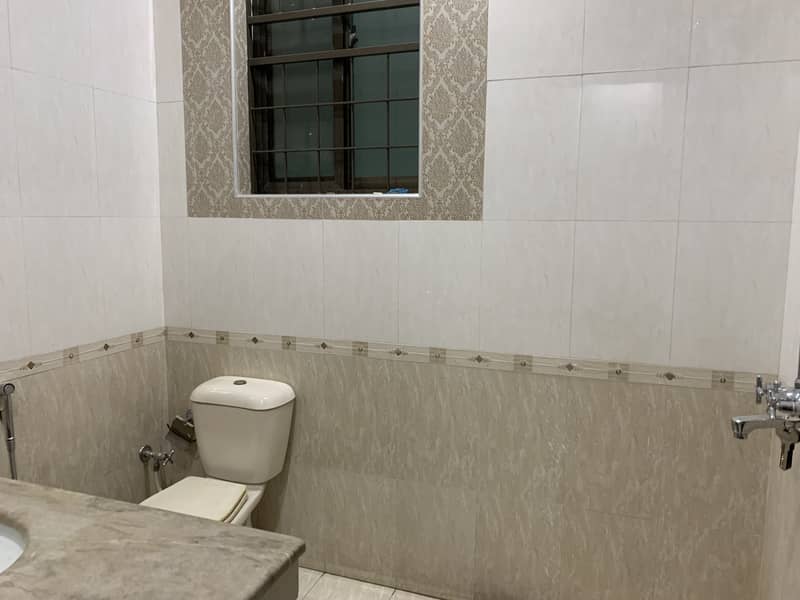 12 marla house for sale in Johar Town block p  Semi commercial (0rignal pictures) Hot location  Tile flooring  Double kitchen unit Hot location  Main apporced 8