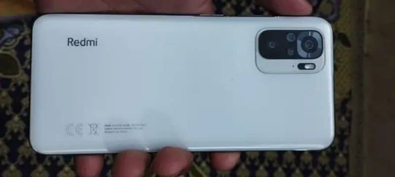 redmi note 10. . 6/128. . . with box and charger. . . 0