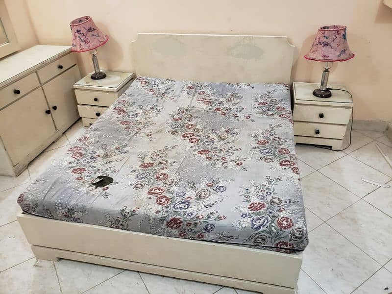 Bed with mattress. . side tables. . dressing table. . 2