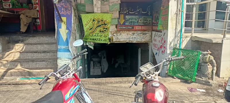 300 Square Feet Shop is Available For Sale in Umar Block Allama Iqbal Town Lahore 9