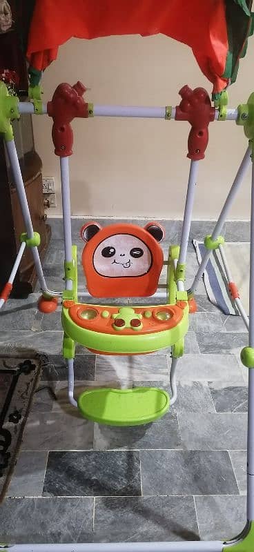 Orange and green swing for kids 1