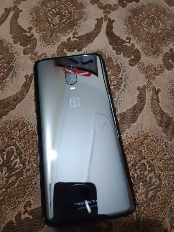 one plus 6T 8/128 waterpack . dual sim 1