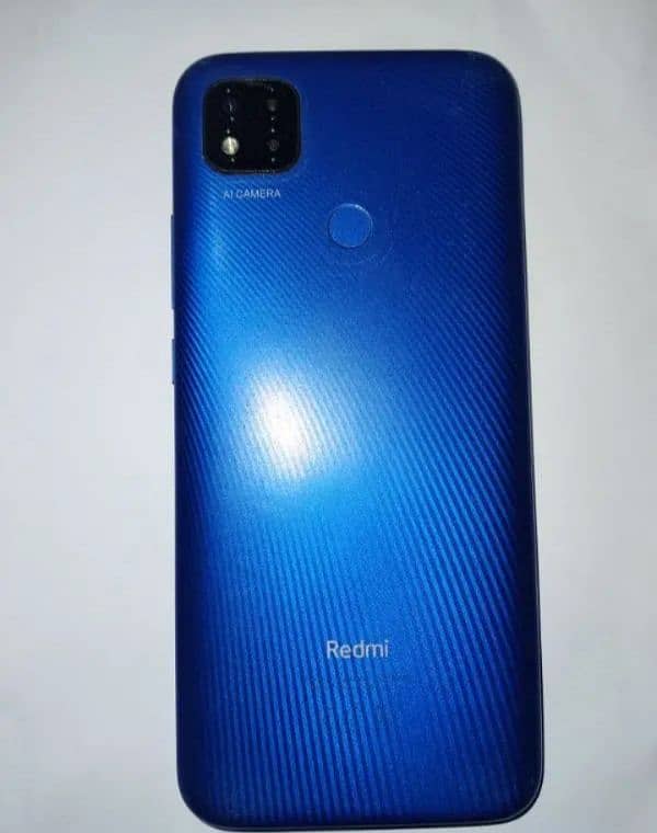 Redmi 9c with ear buds 0