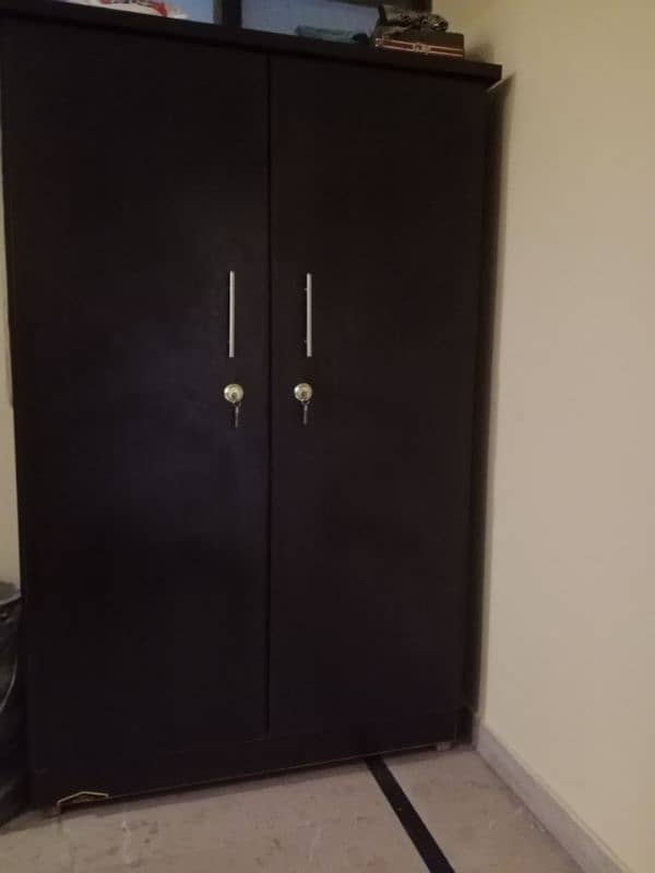 two single beds with matrice and two doors wardrobe 2