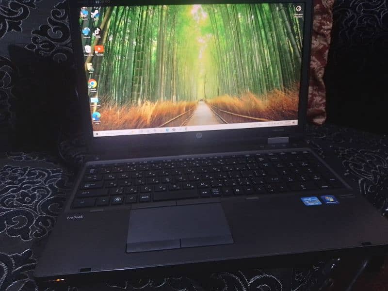 hp probook with charger and bag in good condition 0