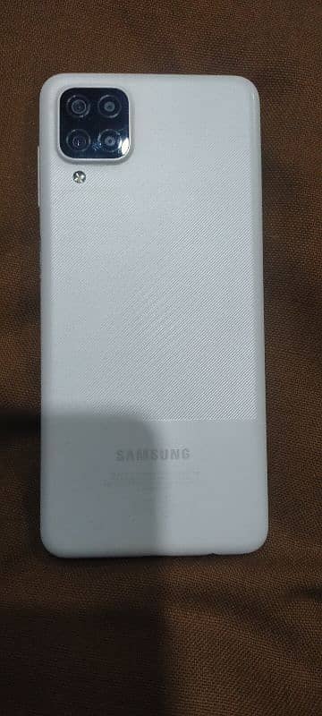 samsung A12 one hand use 10/10 with box and charger 0