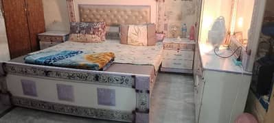 bed with 2 side table and matress