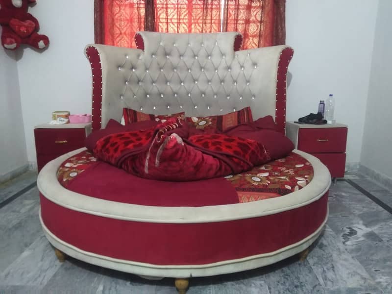 Round cusion bed with 2 bed side tables and mini dressing 1