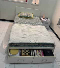 imported bed frame with two drawers for storage