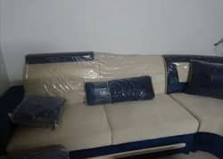 L shaped 9 seater sofa with center table