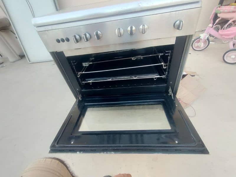 Nas Gas 5 burners on top + dual oven 2