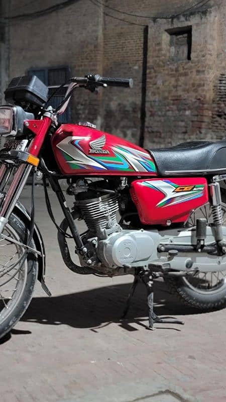 honda 125 red colour 0