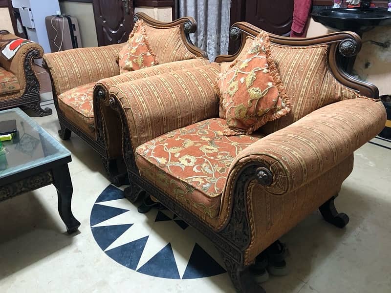 heavy wood 7 seater sofa set with cushions no table include 3