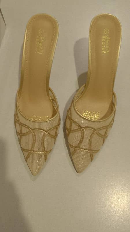 Brand New Imported Golden Heels 2