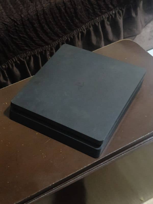 used PlayStation 4 slim very very good condition not damaged 1 cd 0