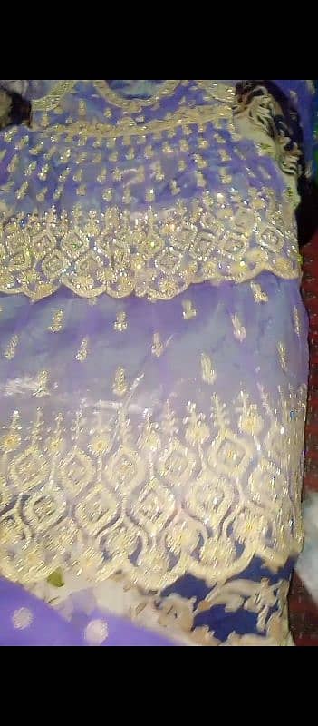 one time use. lehnga light purple. full new pieace 1st time use. 0