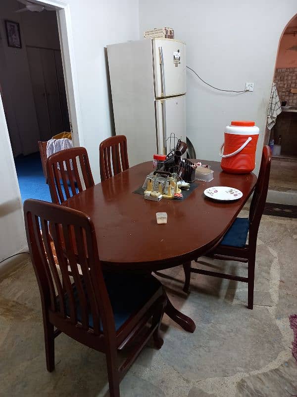 wooden Dining Table with 4 chairs and chair cushions 3