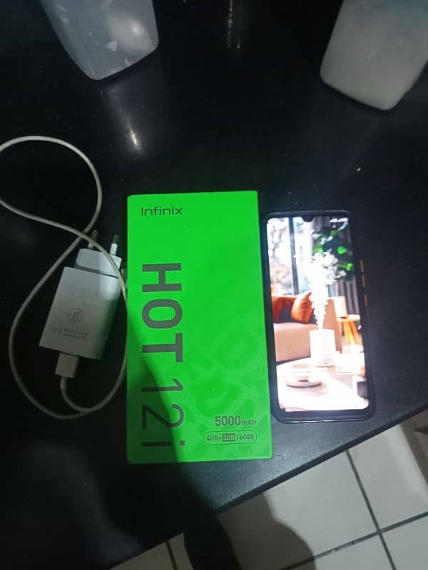 infinx hot 12 i phone ok hi lush condition sab tarha se ok hi 4.64 7