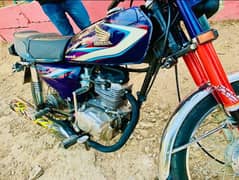 Honda CG125 Model 2003) TOTAL GENIU)