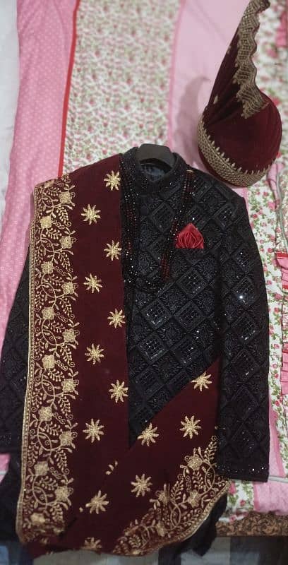 Sharvani + Black kurta suit + red kula+Black kusaa 1