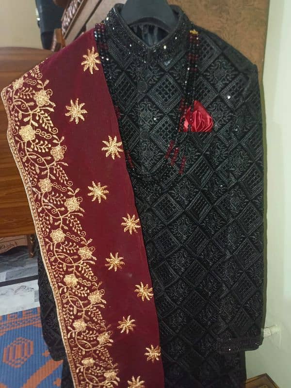 Sharvani + Black kurta suit + red kula+Black kusaa 2