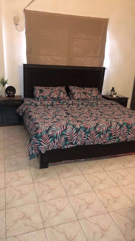 Solid wooden used king size bed 1