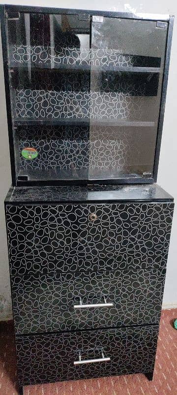 3 drawers and one mirror box same color black almost new condition 1