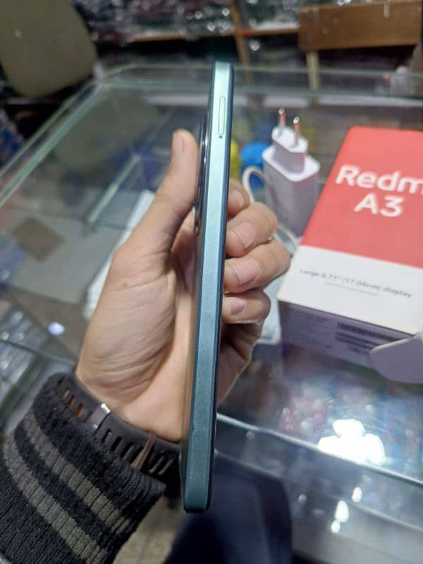 redmi a3 with box charger good condition 1