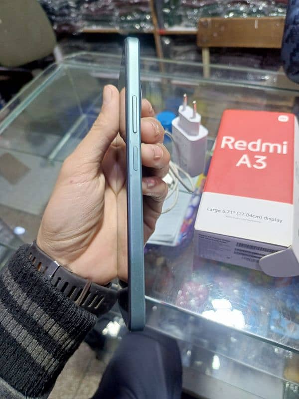 redmi a3 with box charger good condition 6