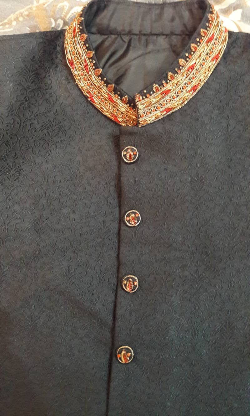 Sherwani black maroon and gold combination. 0