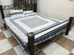 Double size Iron bed for sale with form.