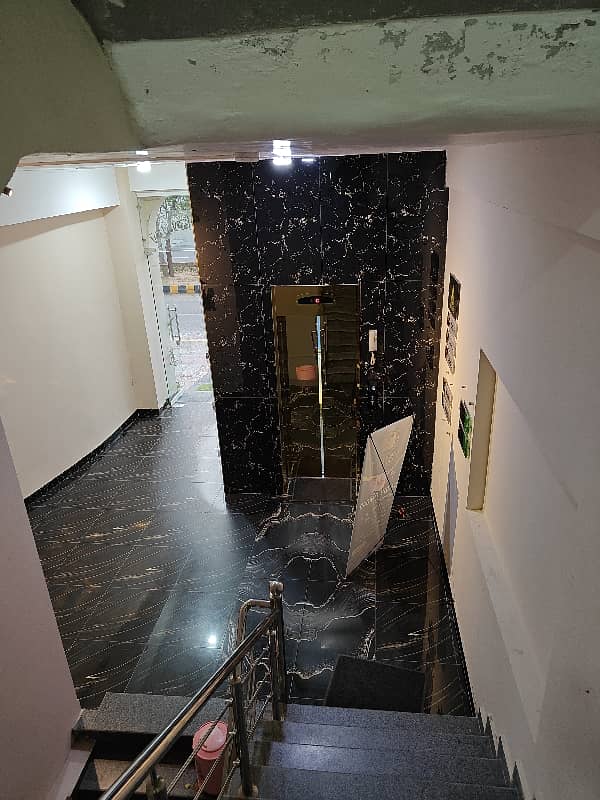 1 KANAL 3RD FLOOR HALL WITH LIFT BASEMENT PARKING FOR RENT ON MAIN ROAD 12