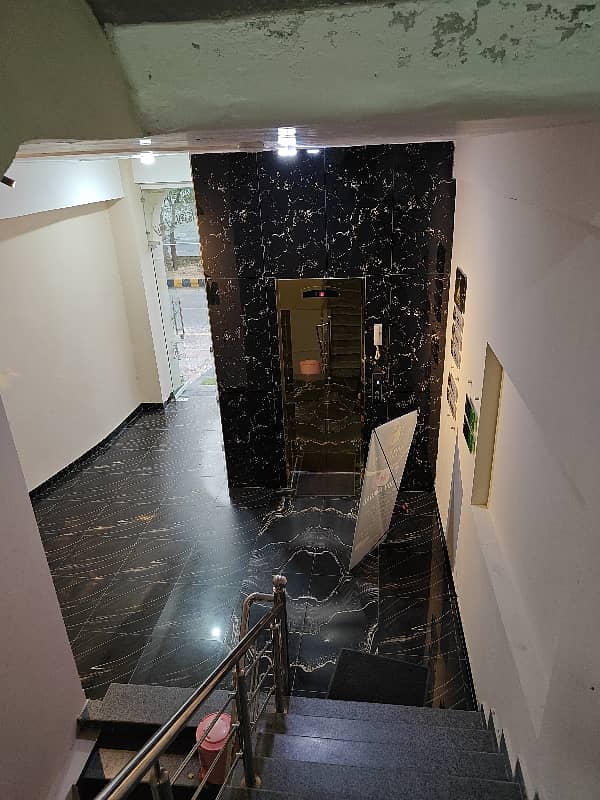 1 KANAL 3RD FLOOR HALL WITH LIFT BASEMENT PARKING FOR RENT ON MAIN ROAD 13