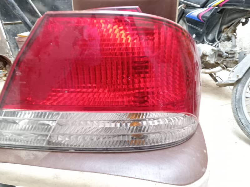 Mitsubishi lancer both left and right Tail lights 2002-2003 model 1