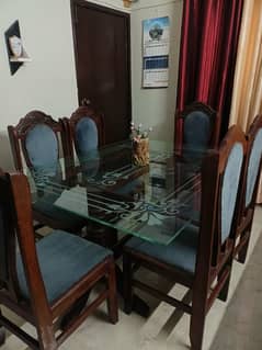 Elegant sheesham base glass dining table with 6 velvet chairs