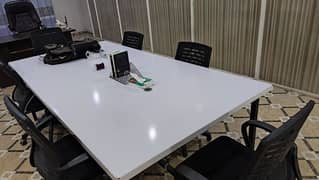 8 by 4 Conference Table for sale along with 5 revolving chairs