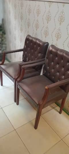 two brown chairs