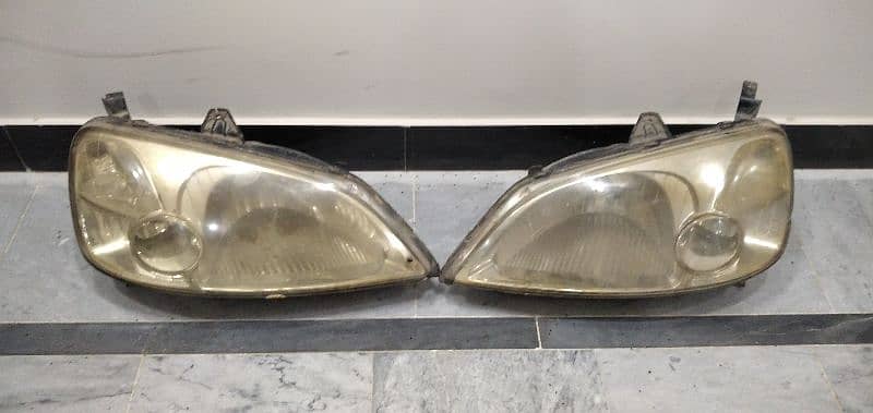 Honda civic 2002 headlight pair. 0