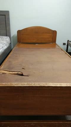 brown wooden bed used