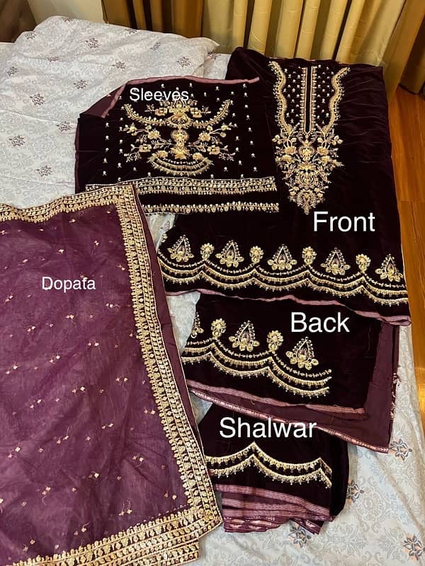 fancy soft velvet embroidered complete suit is available for selling. 2